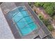Aerial view of the screened pool showcasing the pool's size and privacy at 8204 Reynolds Dr, Hudson, FL 34667