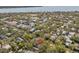 This aerial view showcases the property's proximity to the bay and other homes within the waterfront neighborhood at 914 S Bruce St, Tampa, FL 33606