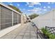 View of patio with a bench, and a fenced-in backyard at 9201 Lunar Ln, Port Richey, FL 34668