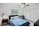 Cozy bedroom with a window for natural light and a closet for ample storage at 9405 Ashley Dr, Weeki Wachee, FL 34613