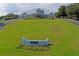 The Club's grand facade is complemented by a sprawling lawn and inviting entryway at 9405 Ashley Dr, Weeki Wachee, FL 34613