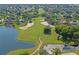 Picturesque golf course with serene lake views surrounded by lush landscaping and residences at 9405 Ashley Dr, Weeki Wachee, FL 34613