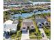Waterfront homes featuring boat docks along a beautiful canal leading to the bay at 944 Symphony Isles Blvd, Apollo Beach, FL 33572