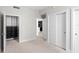 Bedroom with walk-in closet, carpet, and the modern finishes and design details at 1120 E Kennedy Blvd # 1126, Tampa, FL 33602