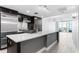 Modern kitchen with stainless steel appliances, a large island, and an open floor plan offering ample space at 1120 E Kennedy Blvd # 1126, Tampa, FL 33602