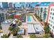 Aerial view of rooftop pool area with city skyline providing an attractive amenity for residents to enjoy at 1120 E Kennedy Blvd # 1126, Tampa, FL 33602