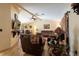 Cozy living room featuring tile floors, a ceiling fan, and neutral-colored walls at 11304 Sedgefield Ave, Spring Hill, FL 34608