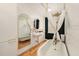 Elegant bathroom featuring a clawfoot tub, gold fixtures, and classic design elements for a spa-like experience at 1210 E Sligh Ave, Tampa, FL 33604