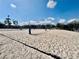 Outdoor beach volleyball court with light cloud cover above at 1210 E Sligh Ave, Tampa, FL 33604