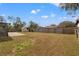 Large backyard with a shed and patio space at 1314 Oak Valley Dr, Seffner, FL 33584