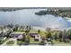 Breathtaking aerial view of the lakefront property, showcasing its serene setting at 2050 W Bearss Ave, Tampa, FL 33618