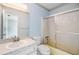 Bathroom with a glass shower and a vanity sink at 2050 W Bearss Ave, Tampa, FL 33618