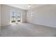 Bedroom featuring a ceiling fan and sliding doors at 2050 W Bearss Ave, Tampa, FL 33618