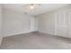 Bedroom featuring a ceiling fan and closet at 2050 W Bearss Ave, Tampa, FL 33618