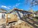 Exterior view of the home with the backyard deck at 2111 26Th S St, St Petersburg, FL 33712