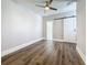 This bedroom boasts modern ceiling fan, neutral walls, sleek flooring, sliding barn door at 2111 26Th S St, St Petersburg, FL 33712