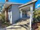 Exterior of the house with stone steps leading to the front door and porch at 2111 26Th S St, St Petersburg, FL 33712