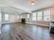 Spacious living room with natural light, fireplace and seamlessly connects to the kitchen at 2111 26Th S St, St Petersburg, FL 33712