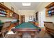 Cozy billiard room with custom built-ins, a pool table, and a serene ambiance at 2717 Via Cipriani # 614B, Clearwater, FL 33764