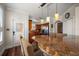 Inviting dining area features granite countertops, modern lighting, and easy access to the kitchen at 2717 Via Cipriani # 614B, Clearwater, FL 33764