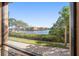 Scenic view of the waterfront community from a screened patio, capturing the tranquil surroundings at 2717 Via Cipriani # 614B, Clearwater, FL 33764