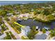 Aerial view of a waterfront property showcasing its location and neighborhood at 320 Georgia Ave, Crystal Beach, FL 34681