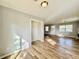 Spacious living room featuring hardwood floors and neutral wall color at 3902 W Iowa Ave, Tampa, FL 33616