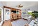 Cozy living room with wood paneling, comfortable seating, and natural light at 4921 24Th S Ave, Gulfport, FL 33707