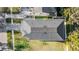 Aerial view of a house showcasing the roof, backyard, and proximity to nearby streets and landscaping at 619 Danube Ave, Tampa, FL 33606