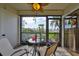 Screened porch with seating and views of the beach at 6365 Bahia Del Mar Blvd # 112, St Petersburg, FL 33715