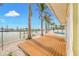 Backyard deck overlooking the water, providing a perfect spot to relax and entertain at 7984 1St S Ave, St Petersburg, FL 33707