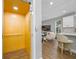 Interior view highlighting a residential elevator and open floor plan with wood floors at 876 Callista Cay Loop, Tarpon Springs, FL 34689