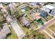 Aerial view of the property showcasing its location, including a brick road and nearby houses at 902 W Fribley St, Tampa, FL 33603