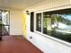 Welcoming front porch with brick accents and a bright yellow front door at 1101 King Arthur Ct, Valrico, FL 33594