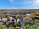 Aerial view of the house, backyard, and surrounding nature and waterway at 1242 Holly Cir, Oldsmar, FL 34677