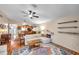 Open-concept living room flows into the kitchen, offering a bright and airy atmosphere at 1242 Holly Cir, Oldsmar, FL 34677