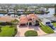 Aerial view of the home shows circular driveway and waterfront location at 1336 51St Ne Ave, St Petersburg, FL 33703