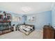 Bright bedroom with natural light, ample storage, and soothing blue walls at 1336 51St Ne Ave, St Petersburg, FL 33703