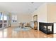 Open main bedroom sitting area with fireplace, access to balcony, and custom cabinetry at 1336 51St Ne Ave, St Petersburg, FL 33703