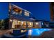 Backyard pool and spa with a covered balcony and a glimpse of the home's interior at 1336 51St Ne Ave, St Petersburg, FL 33703