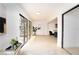 Bright hallway with tile floors, offering great natural light and stylish decor at 14810 Feather Cove Ln, Clearwater, FL 33762