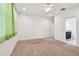 Bright bedroom featuring plush carpeting, a ceiling fan, and lots of natural light at 17596 Terrazzo Way, Land O Lakes, FL 34638