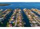 Stunning aerial view of waterfront homes with private docks on a sunny day at 2028 Illinois Ne Ave, St Petersburg, FL 33703