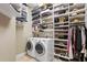 Well-organized closet and laundry area offers ample storage and convenience at 2028 Illinois Ne Ave, St Petersburg, FL 33703