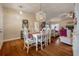 Dining area with seating for six and hardwood floors at 2086 Whitney N Pl, Clearwater, FL 33760