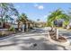 Entrance to the 'Bay Arbor' deed restricted community with nice landscaping and well-kept grounds at 212 Arbor Woods Cir, Oldsmar, FL 34677