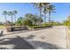 Community entrance sign reads 'Bay Arbor' with manicured landscape in a well-maintained neighborhood at 212 Arbor Woods Cir, Oldsmar, FL 34677