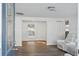 Bright and spacious living room with modern flooring and fresh white walls at 2195 Glen Dr, Safety Harbor, FL 34695