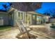 Backyard patio area featuring comfortable seating, patio and sparkling pool at 230 S Julia Cir, St Pete Beach, FL 33706