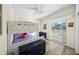 ' bedroom showcases a white bunk bed and sleek navy dressers, offering functional style at 2905 Bay St, Sarasota, FL 34237